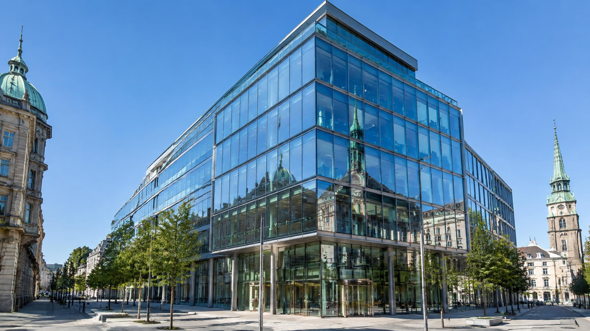 Modern glass office building exterior in a European city